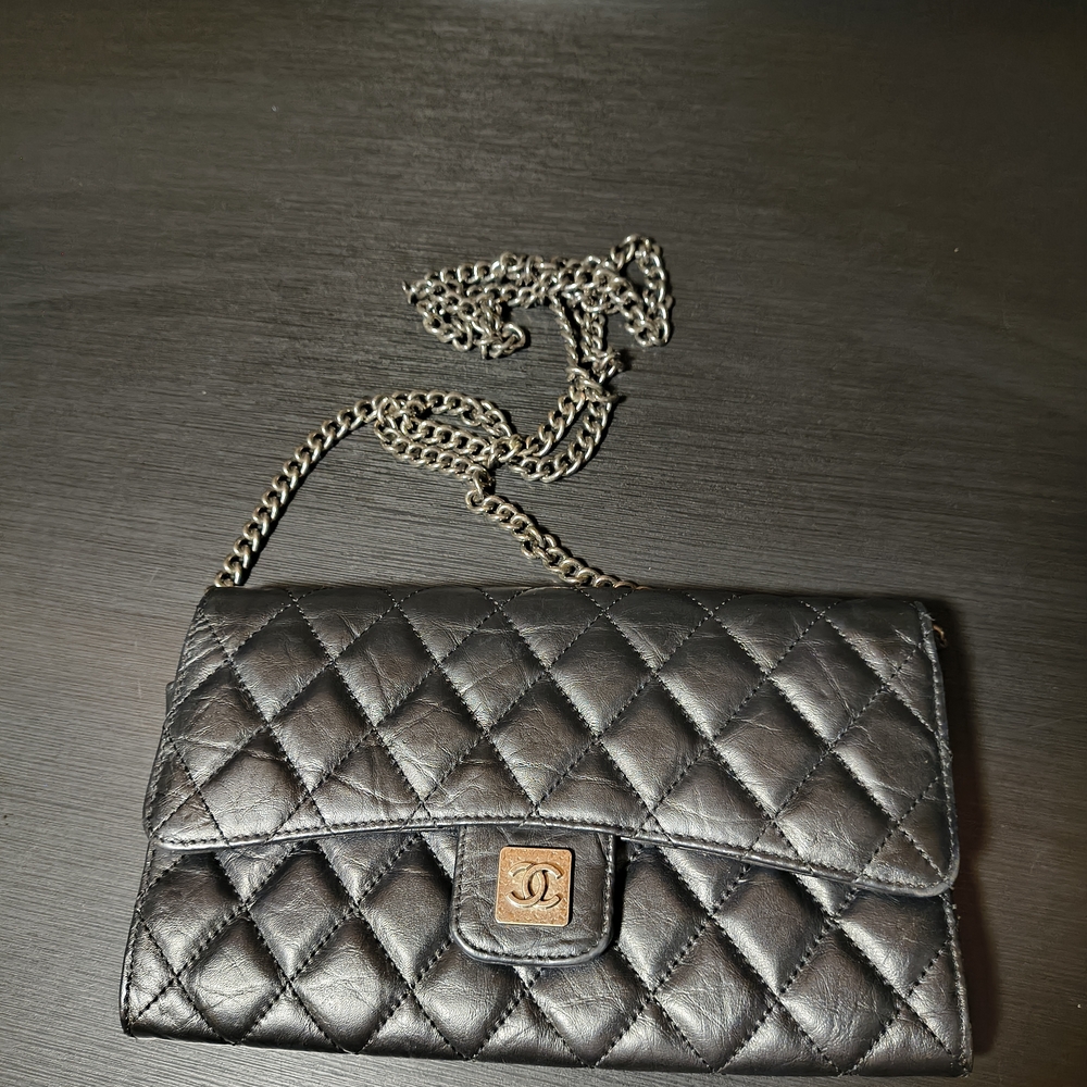 CHANEL Black Quilted Leather Clutch with Chain